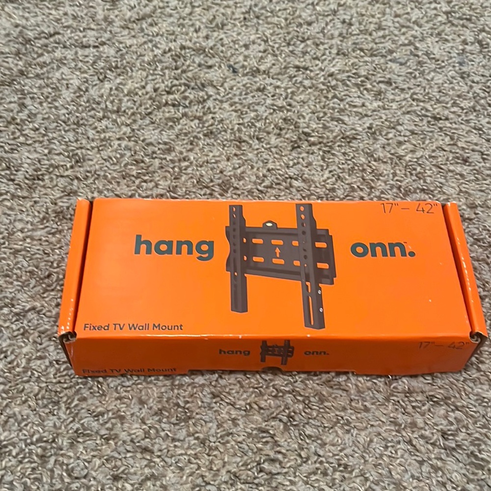 TV wall mount for 17”-42” tv’s. Hang onn brand name. Black mount.